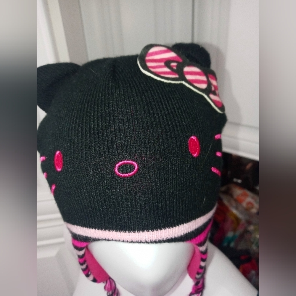 Hello Kitty girl knit beanie ear flap cap w Embroidered face and braided tassels